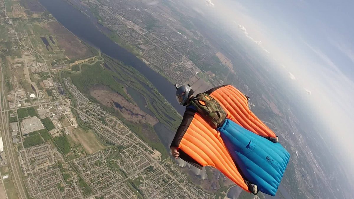 Wingsuit over Ottawa River - Parachute Gatineau-Ottawa Skydive